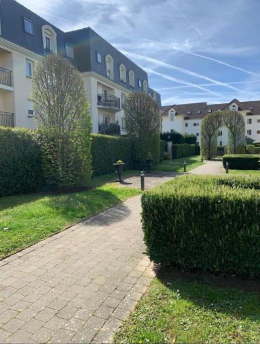 Les Jardins De Magny. Apartamento Exterior foto